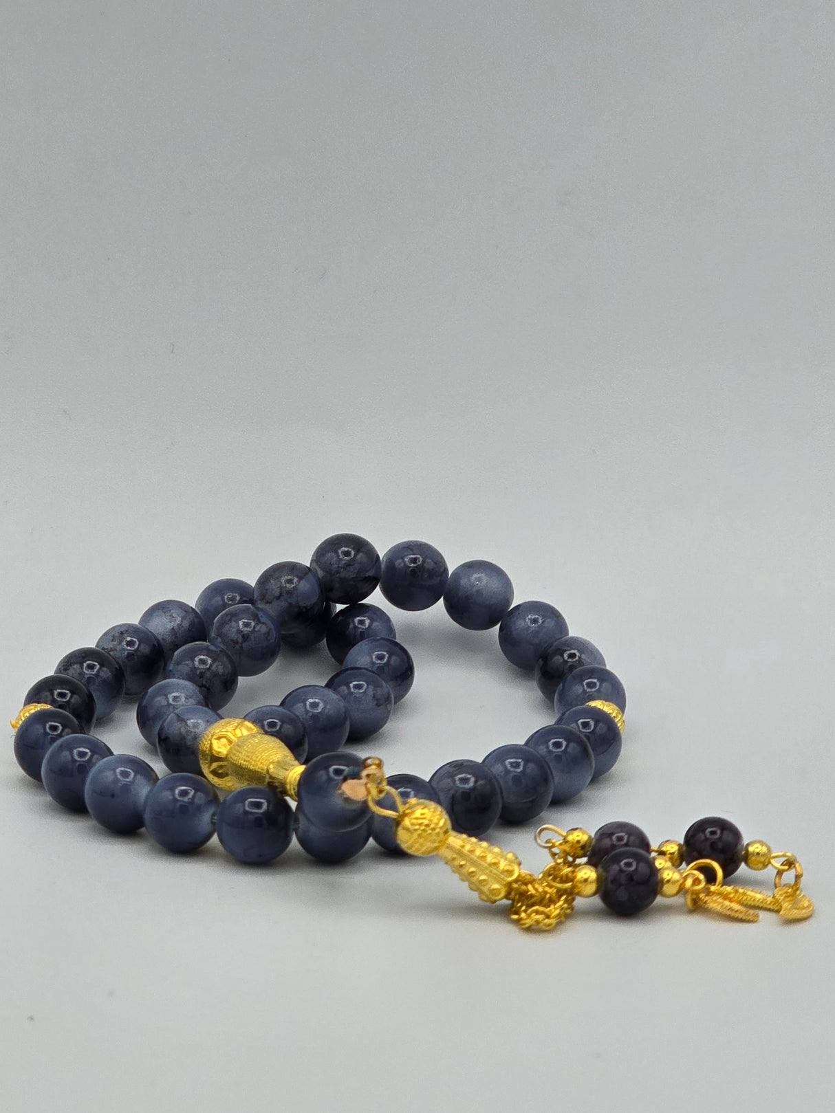 Blue Tasbih with golden Imame مسبحة